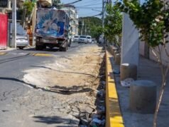 Baches, desniveles y tapones agravan el tránsito en Santo Domingo