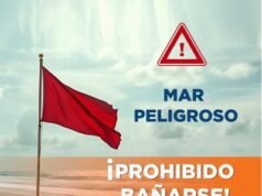 Defensa Civil de Puerto Plata coloca bandera roja por oleaje peligroso